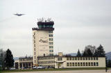Ramstein Air Base, Rheinland-Pfalz, Germany - A retiring C-130 Hercules overflies the control tower at Ramstein AB.